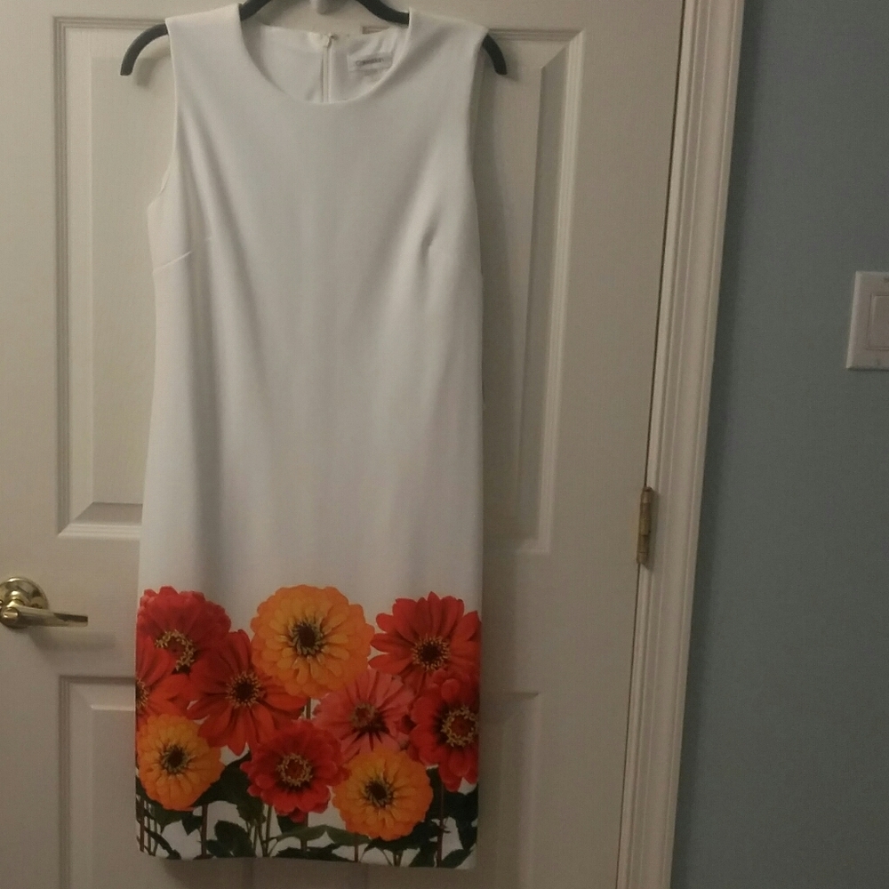 NWT sleeveless dress, with floral print bottom